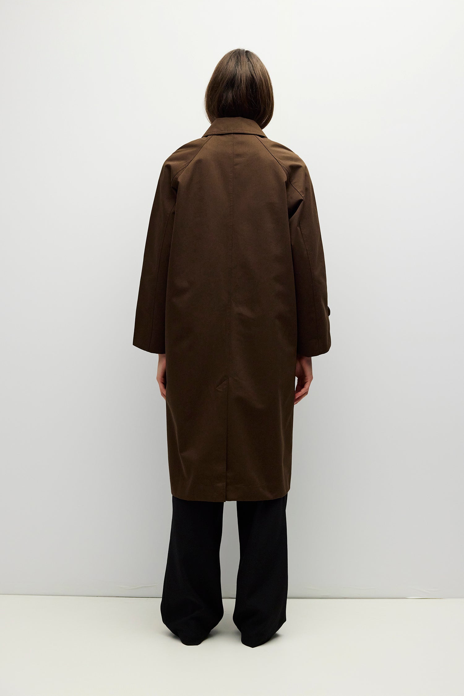 Brown midi trench coat, back view with back slit
