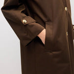 Close up of welt pocket and adjustable cuff detail