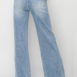 Light blue denim jeans on a white background