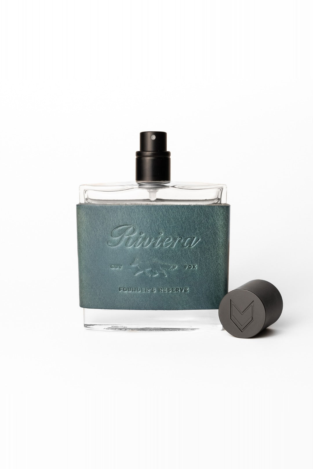 Guy Fox Riviera cologne bottle with cap off on white background