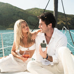 Couple on a sailboat with Guy Fox Riviera cologne