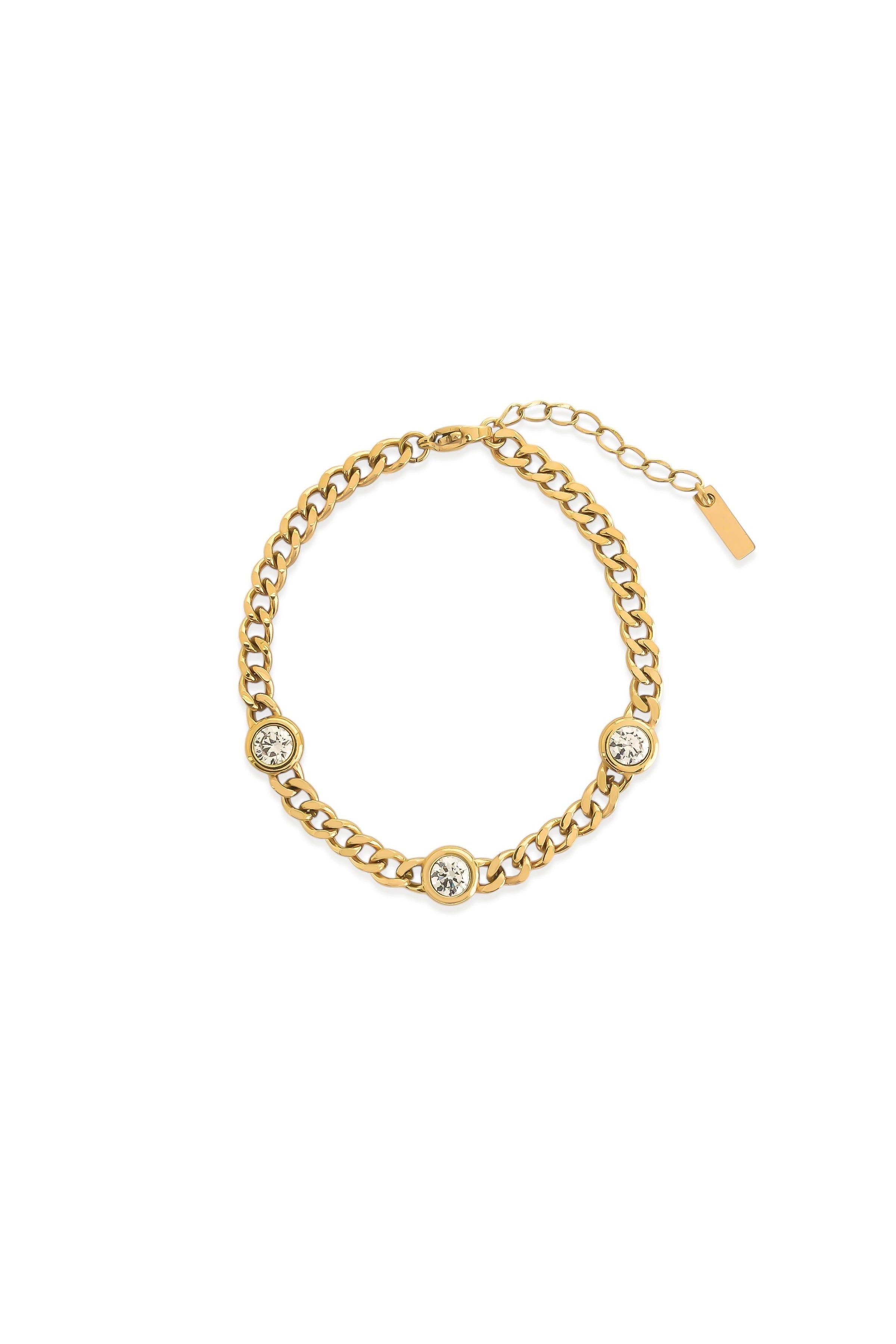 Gold curb chain bracelet with three bezel-set cubic zirconia