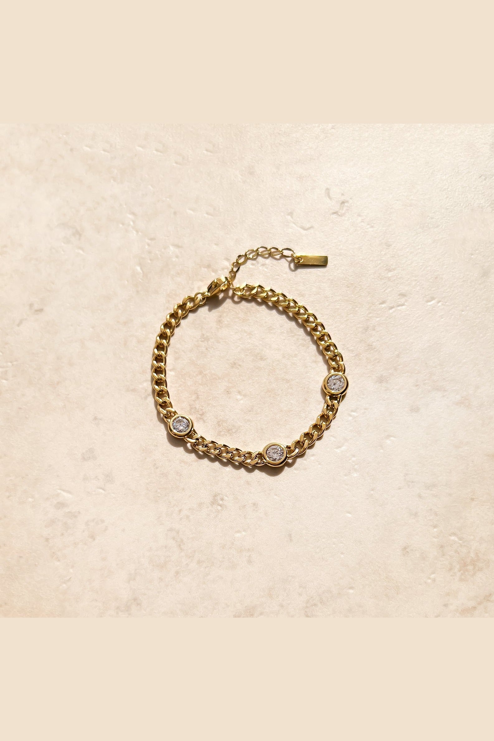 Three station cubic zirconia chain bracelet styled on the wrist
