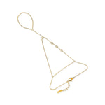 Gold hand chain with four cubic zirconia stations