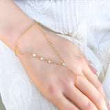 Cubic zirconia hand chain worn from wrist to finger