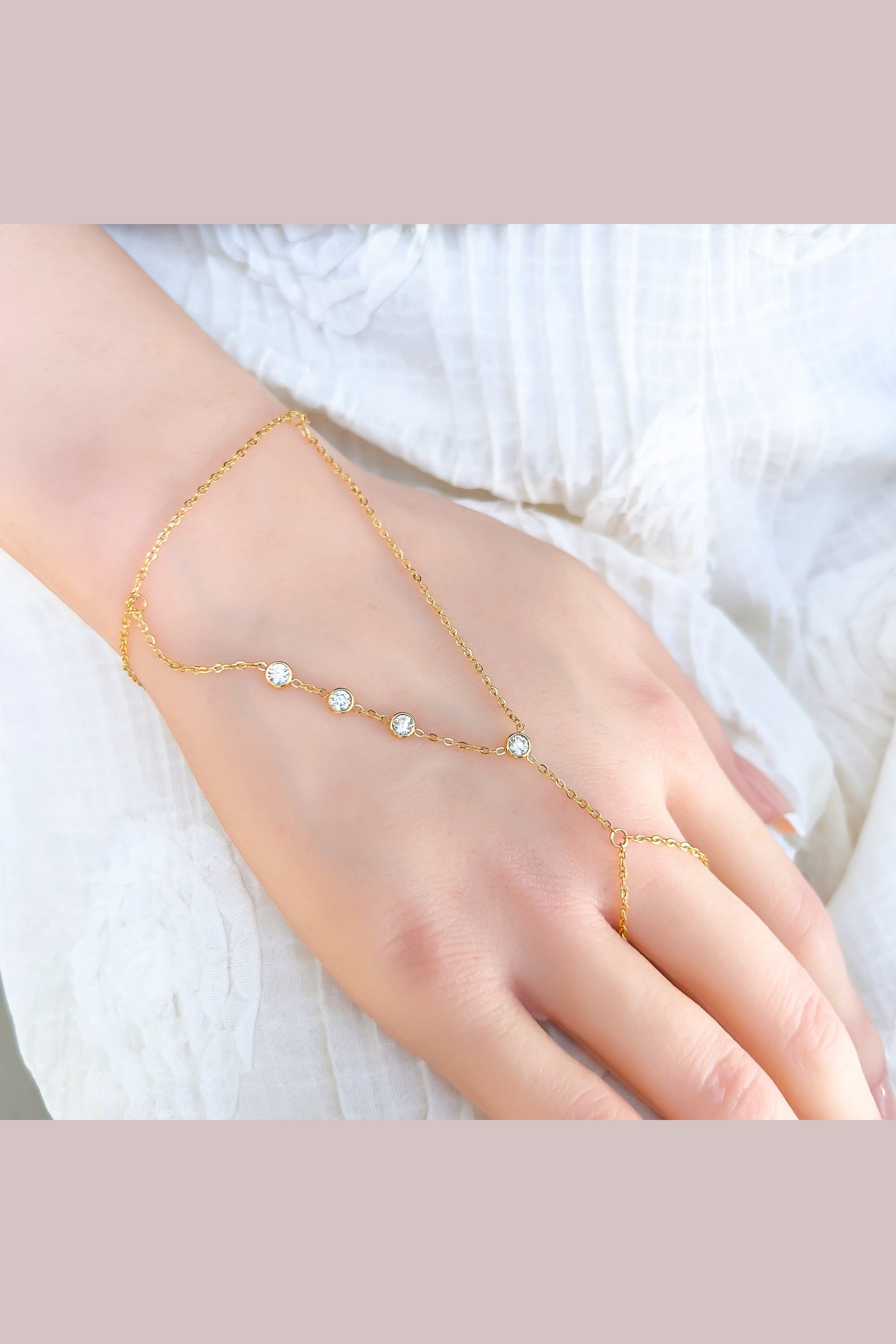 Cubic zirconia hand chain worn from wrist to finger