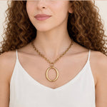 Oval link pendant necklace worn
