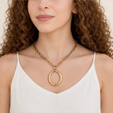 Oval link pendant necklace worn