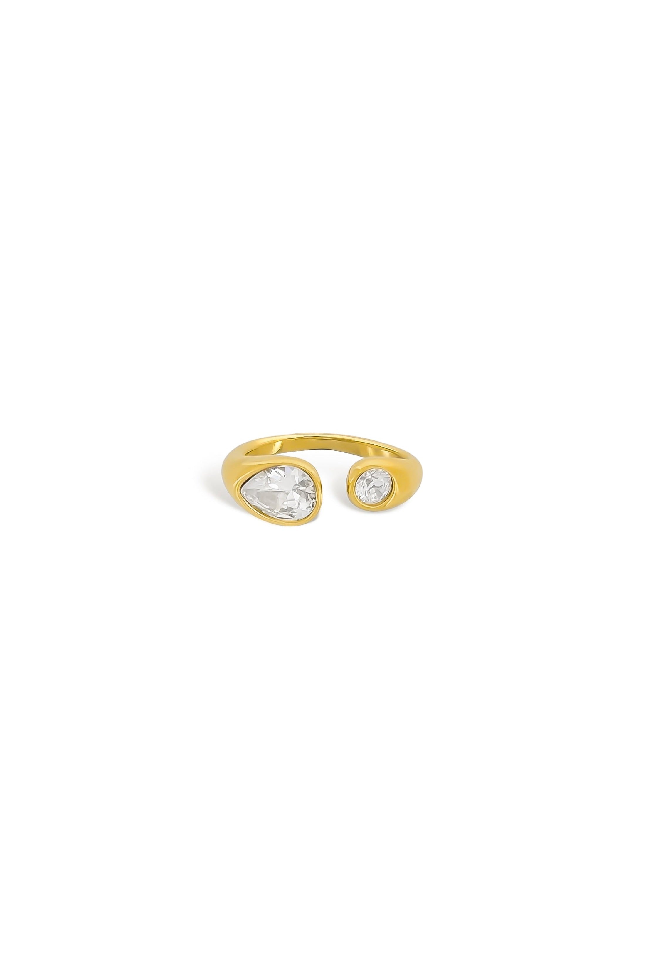 Sculptural wrap ring with pear and round cubic zirconia in gold