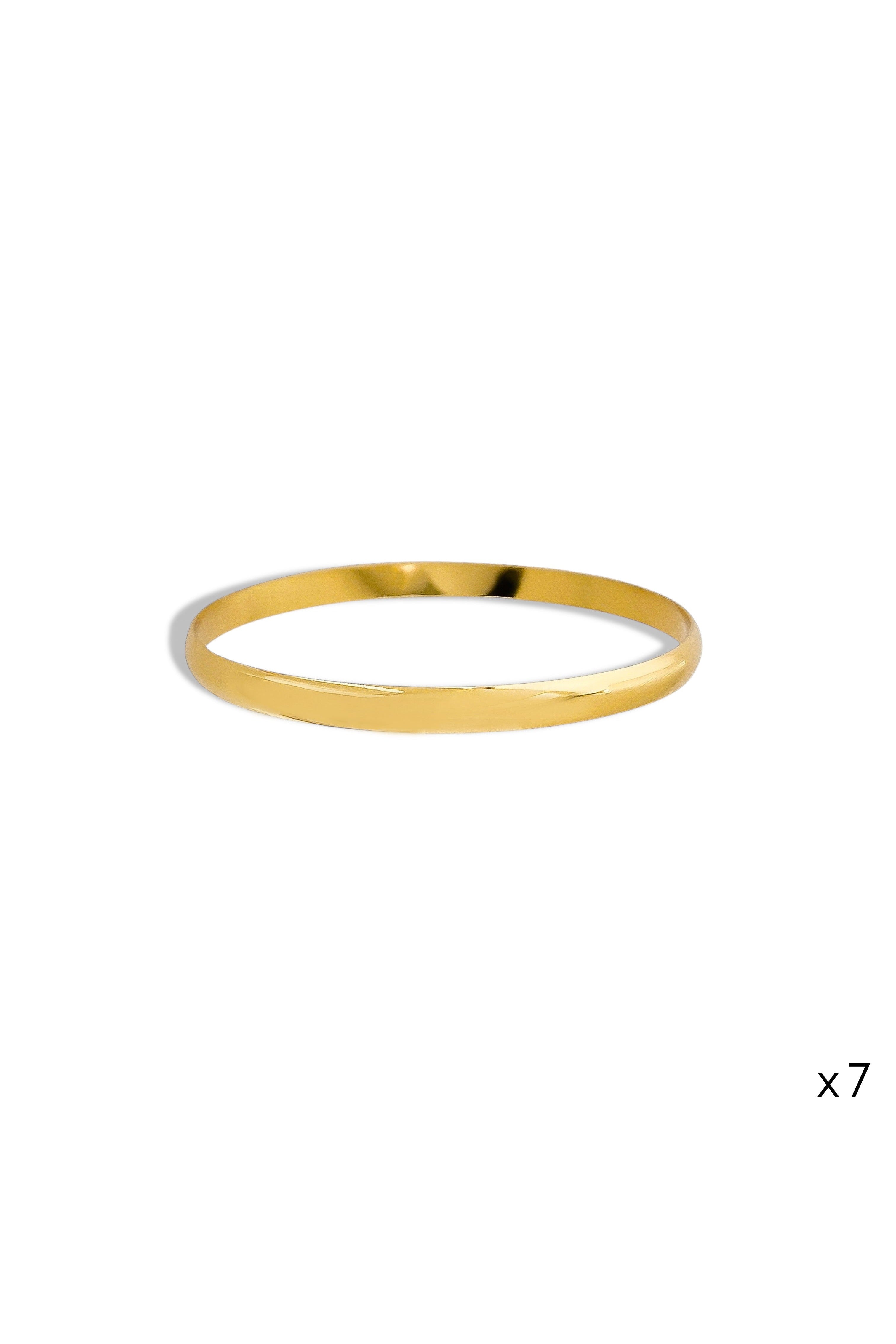 Seven piece polished gold bangle set