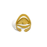 Triple layer sculptural ring gold detail