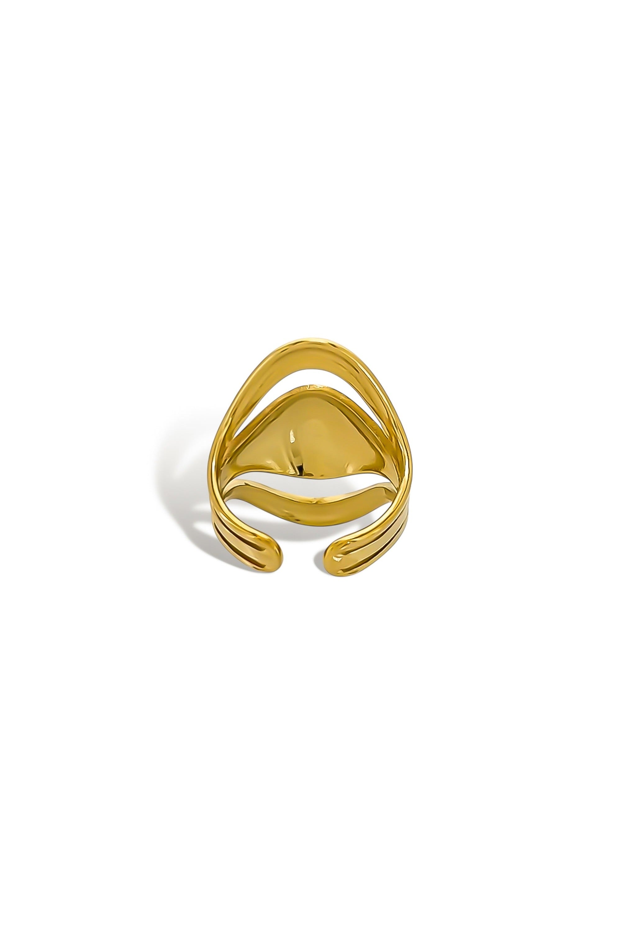 Triple layer sculptural ring gold detail