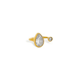 Gold open ring with pear and round bezel-set cubic zirconia