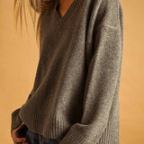 Mocha V-neck knit sweater, side view showing ribbed cuff