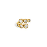 Gold ring with staggered row of bezel-set cubic zirconia