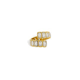 Gold open wrap ring with baguette-cut cubic zirconia