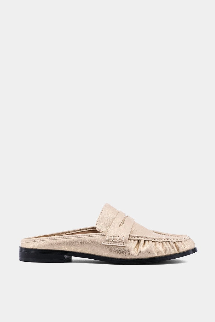 Tuscany penny loafer mule in gold, side profile