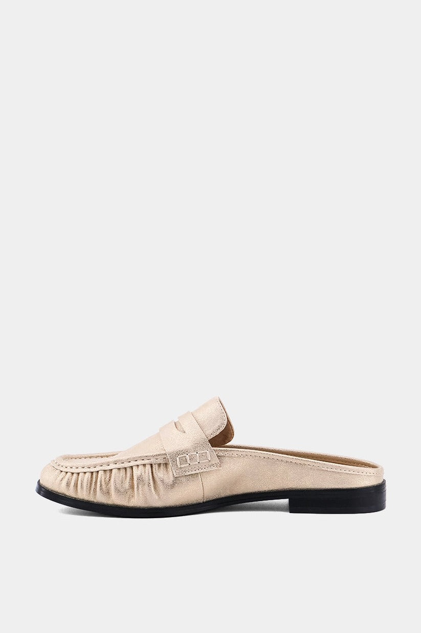 Tuscany penny loafer mule in gold, angled side view