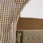 Close up of the mesh back and snapback closure on the Tan and Green Wilson cap
