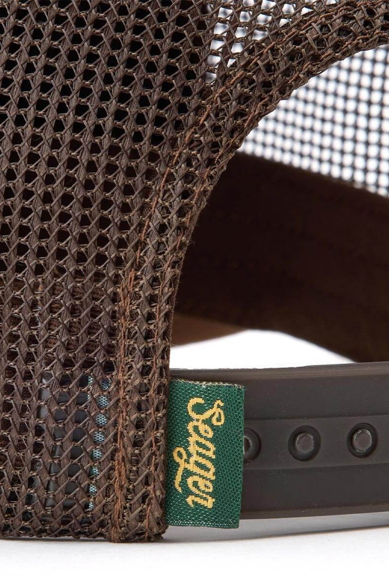 Close up of the mesh back and snapback closure on the Tan Wilson cap