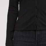 Black button-up shirt worn by a person on a white background