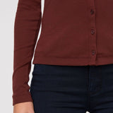 Brown button-up shirt worn by a person on a white background
