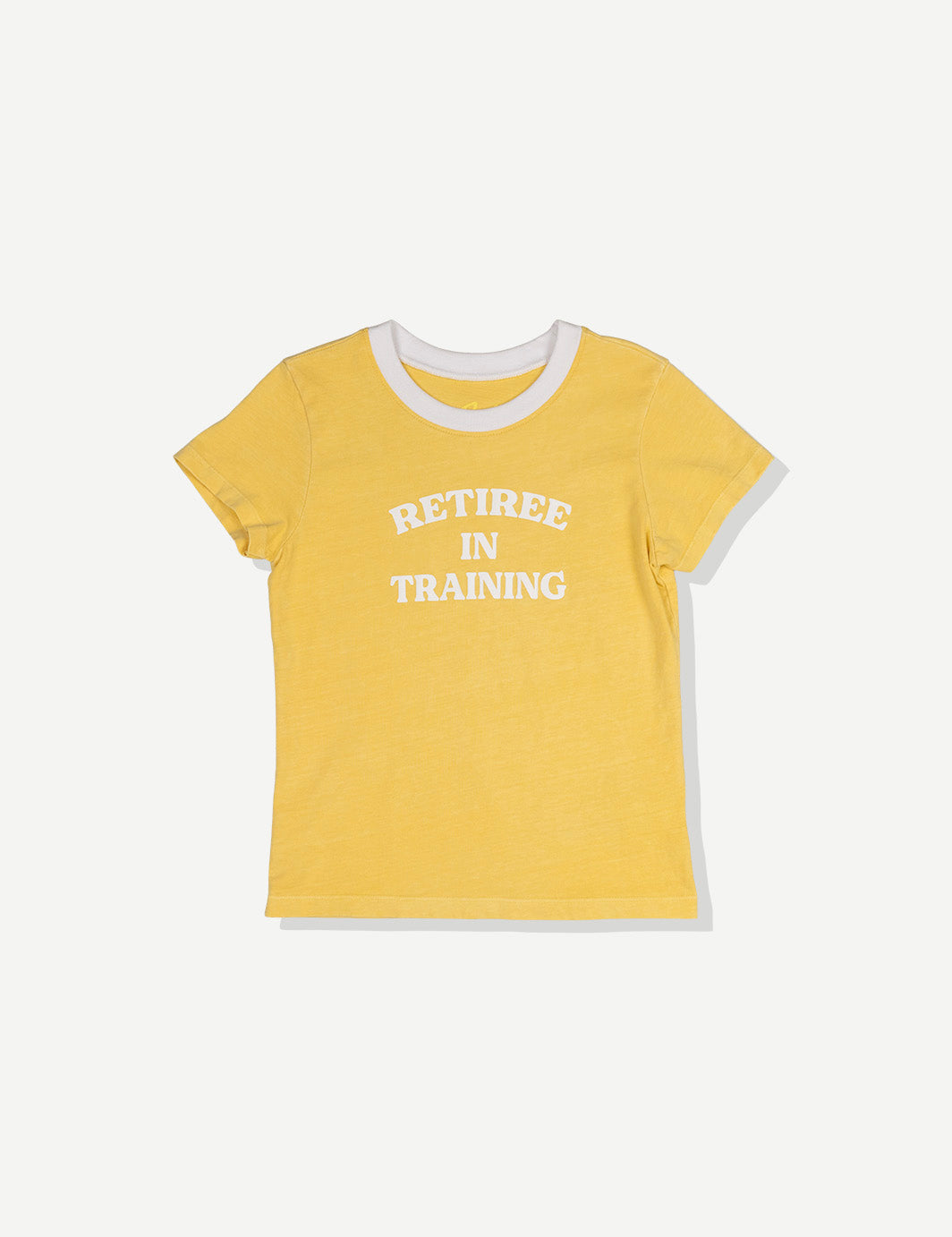 Yellow baby tee with white trim and 'RETIREE IN TRAINING' text on front