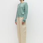 Knit cardigan with contrast trim, side view