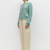 Knit cardigan with contrast trim, side view