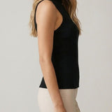 Black sleeveless turtleneck knit top, side view