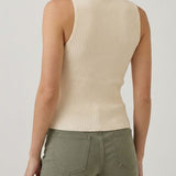 Cream sleeveless turtleneck knit top, back view