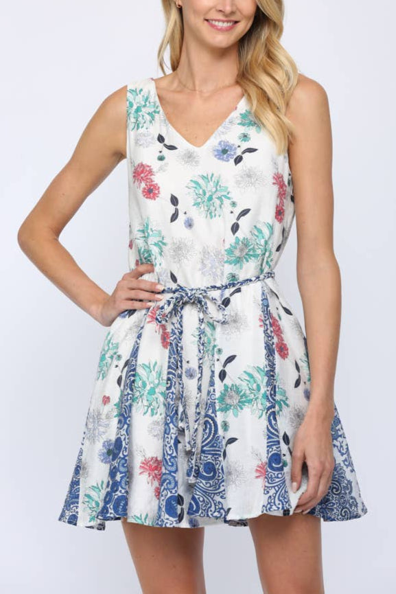 Woman wearing a floral dress on a white background