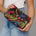 Wildflower Woven Travel Pouch in dark green floral