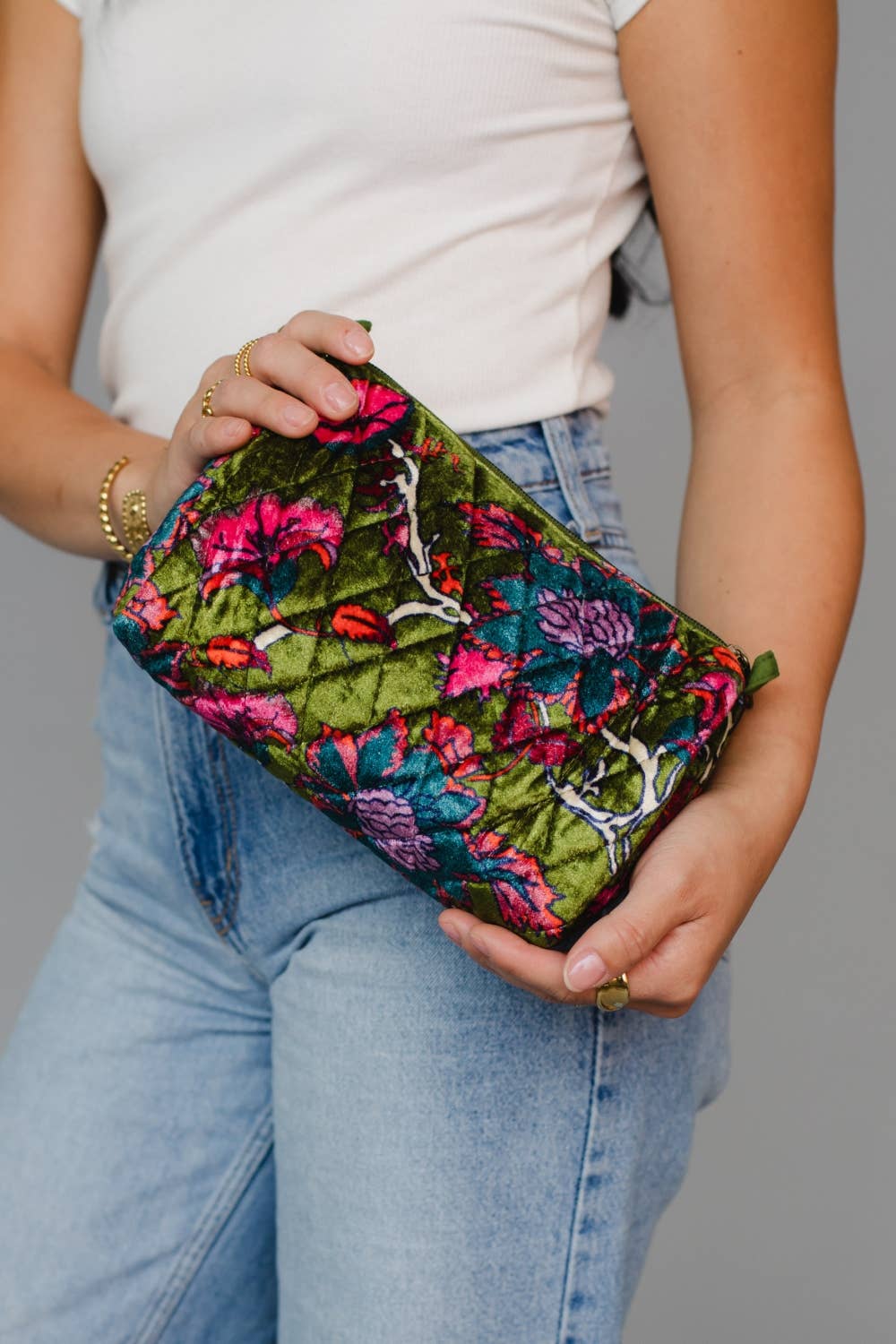 Wildflower Woven Travel Pouch in dark green floral, held