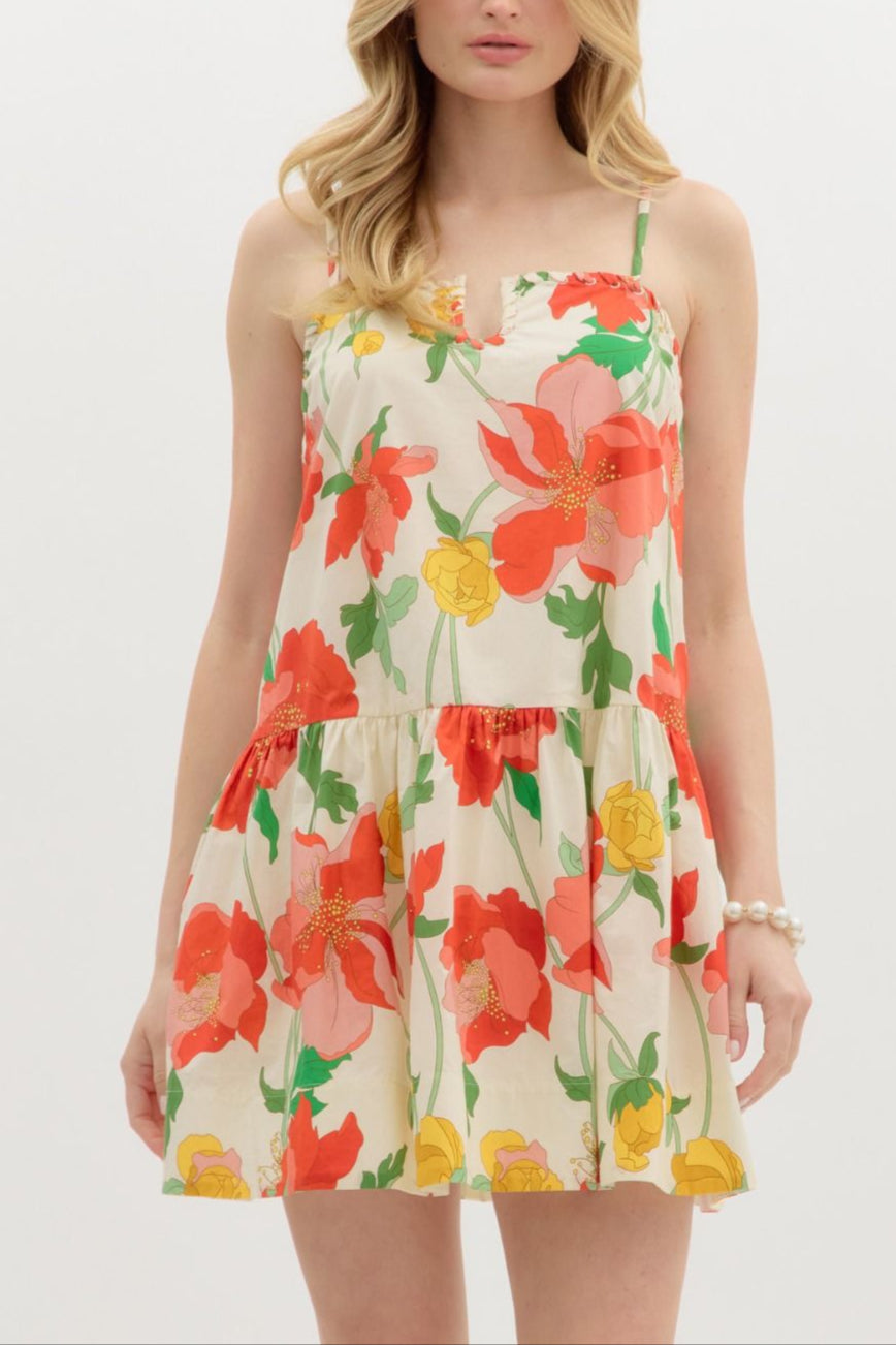 Woman wearing a floral dress on a white background