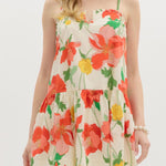 Woman wearing a floral dress on a white background