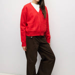 RED 2 fuzzy knit cardigan in red, styled with brown trousers