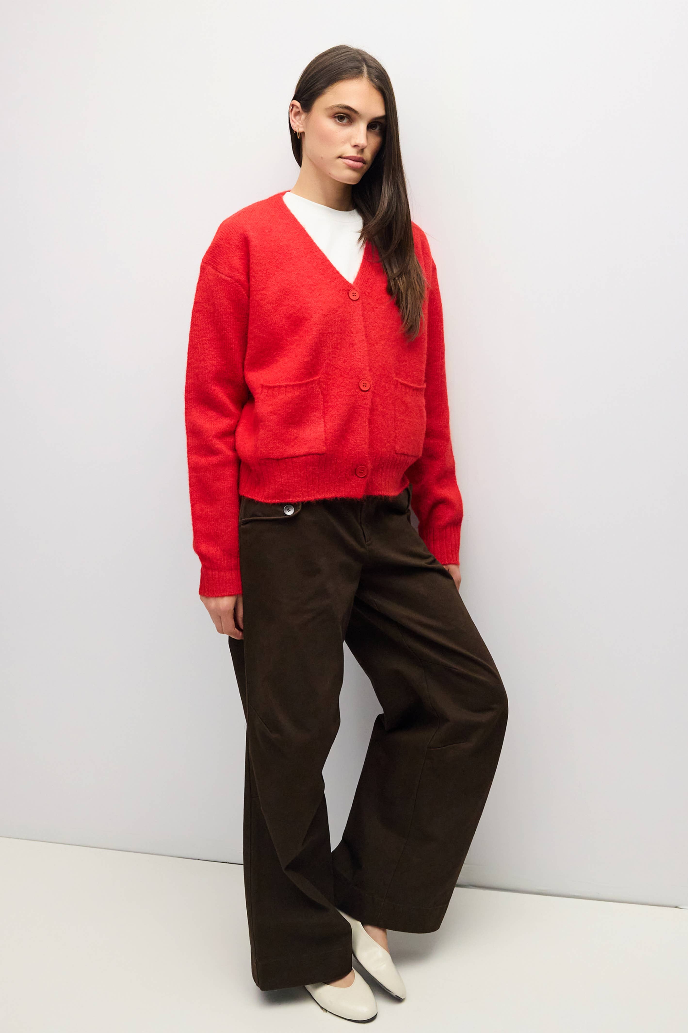 RED 2 fuzzy knit cardigan in red, styled with brown trousers