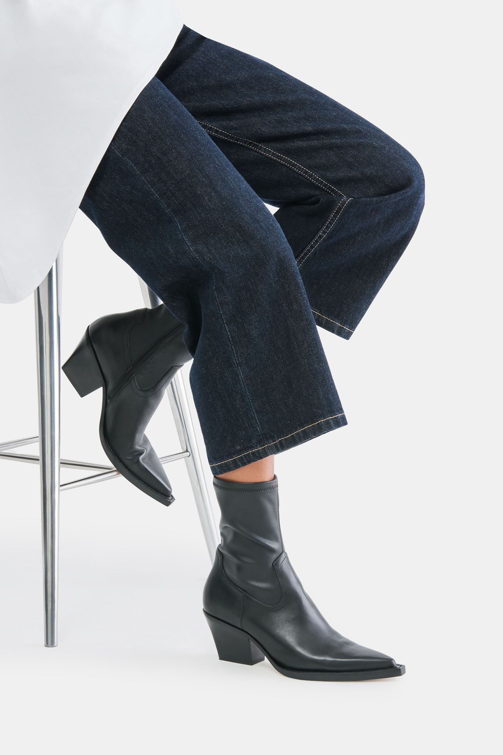Dolce Vita Rutger ankle boot in black leather worn with jeans