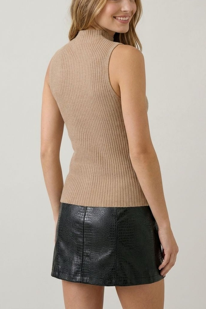 Tan sleeveless turtleneck knit top, back view