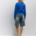 Cambria Rolled Neck Cardigan in blue, side view