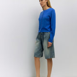 Cambria Rolled Neck Cardigan in blue, back view