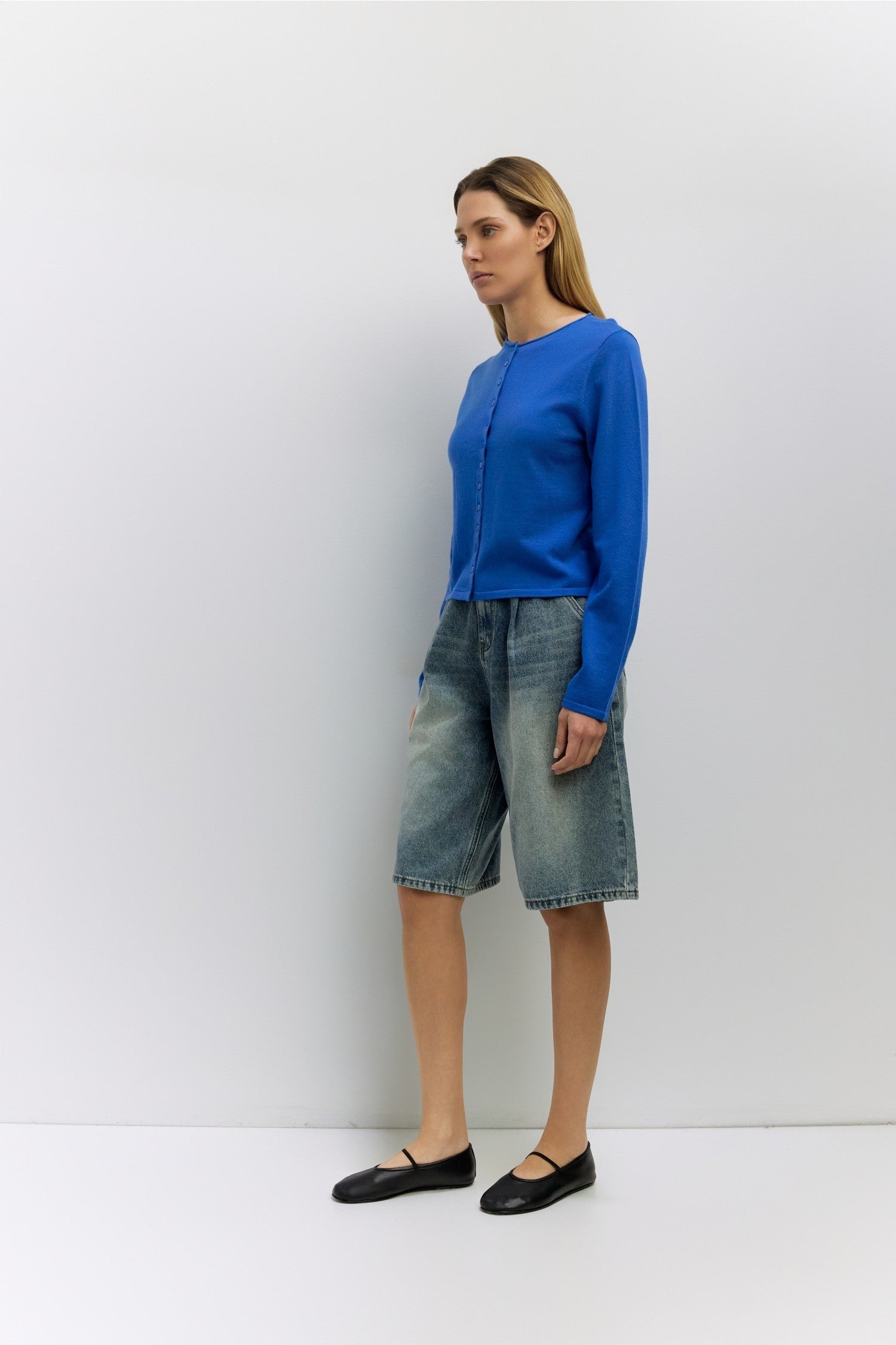 Cambria Rolled Neck Cardigan in blue, back view