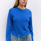 Cambria Rolled Neck Cardigan in blue, detail of rolled neckline and button front
