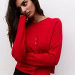 Cambria Rolled Neck Cardigan in red, detail of rolled neckline and button front
