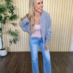Melanie Clean Line Square Cami in Pearl Blush under a grey cardigan, three-quarter view