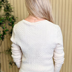 The Lila Cable Knit V-Neck Sweater in Sandshell, back view