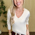 The Lila Cable Knit V-Neck Sweater in Sandshell, front view
