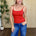 Melanie Clean Line Square Cami in Red with wide-leg jeans, front view