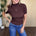 Clove Scallop Mock Neck Sweater in Brown styled on model